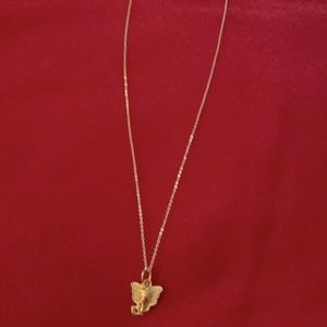 Gold plated necklace with elephant charm.